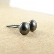 Small silver studs .  Black oxidized sterling silver pebbles